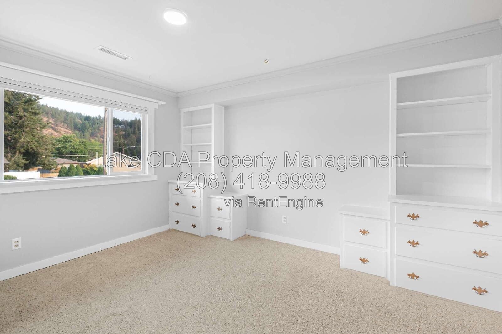 **PRICE REDUCED**Spacious 5 Bed 3 Bath Retreat in Fernan Village! Move-In Ready property image